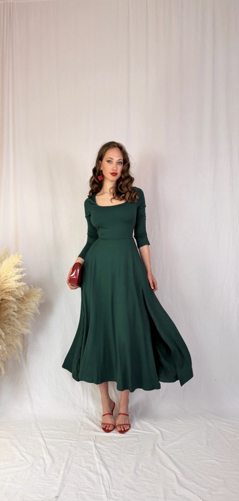 Tmavě zelené šaty z elastického úpletu